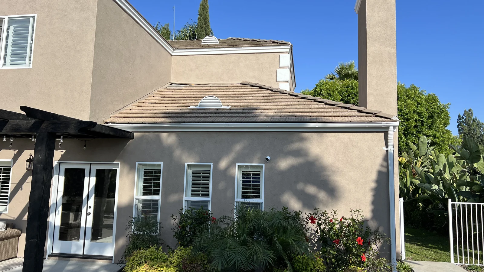 Completed stucco repair and exterior repaint